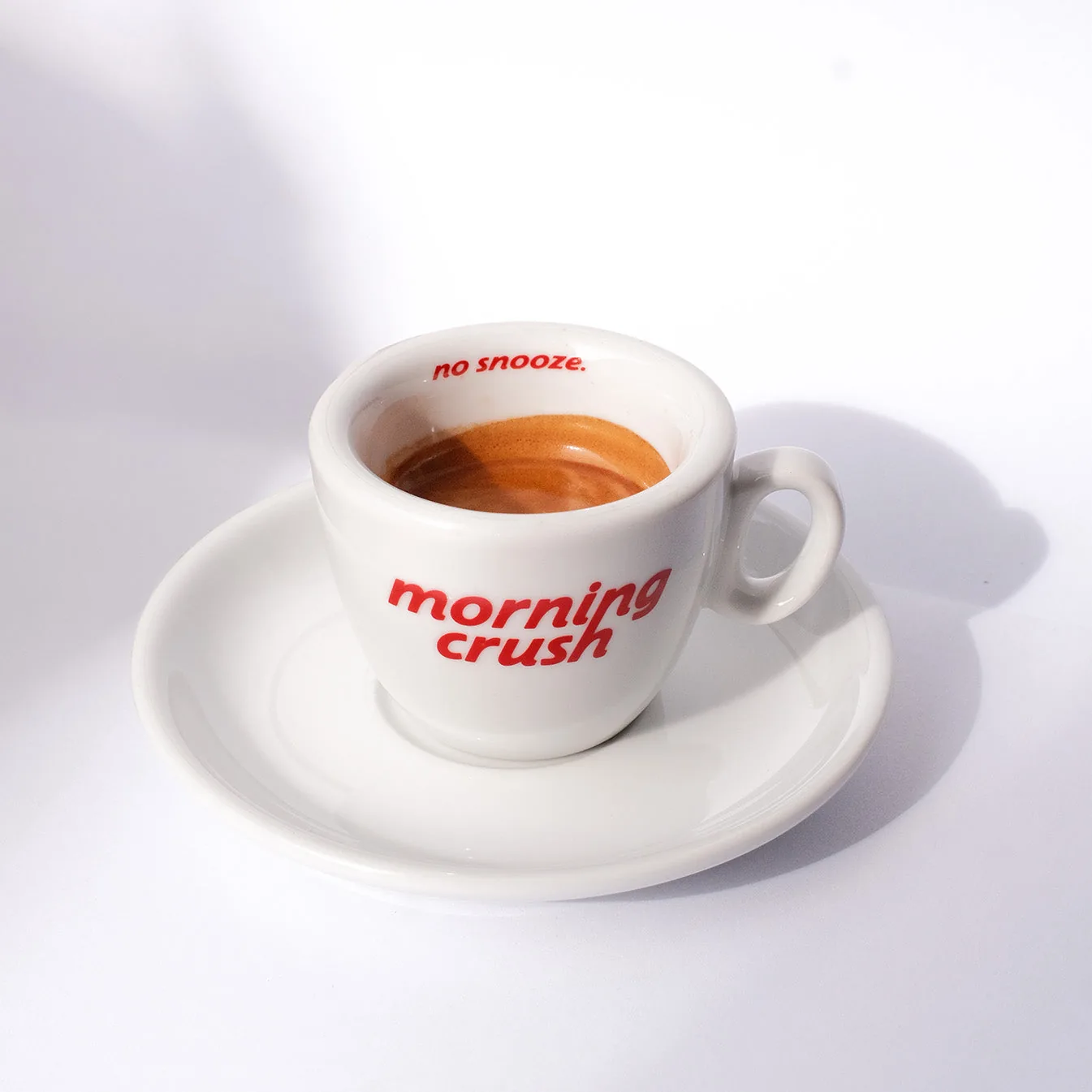 Morning Crush designer espresso cup by artless STUDIO — bold typography on white porcelain