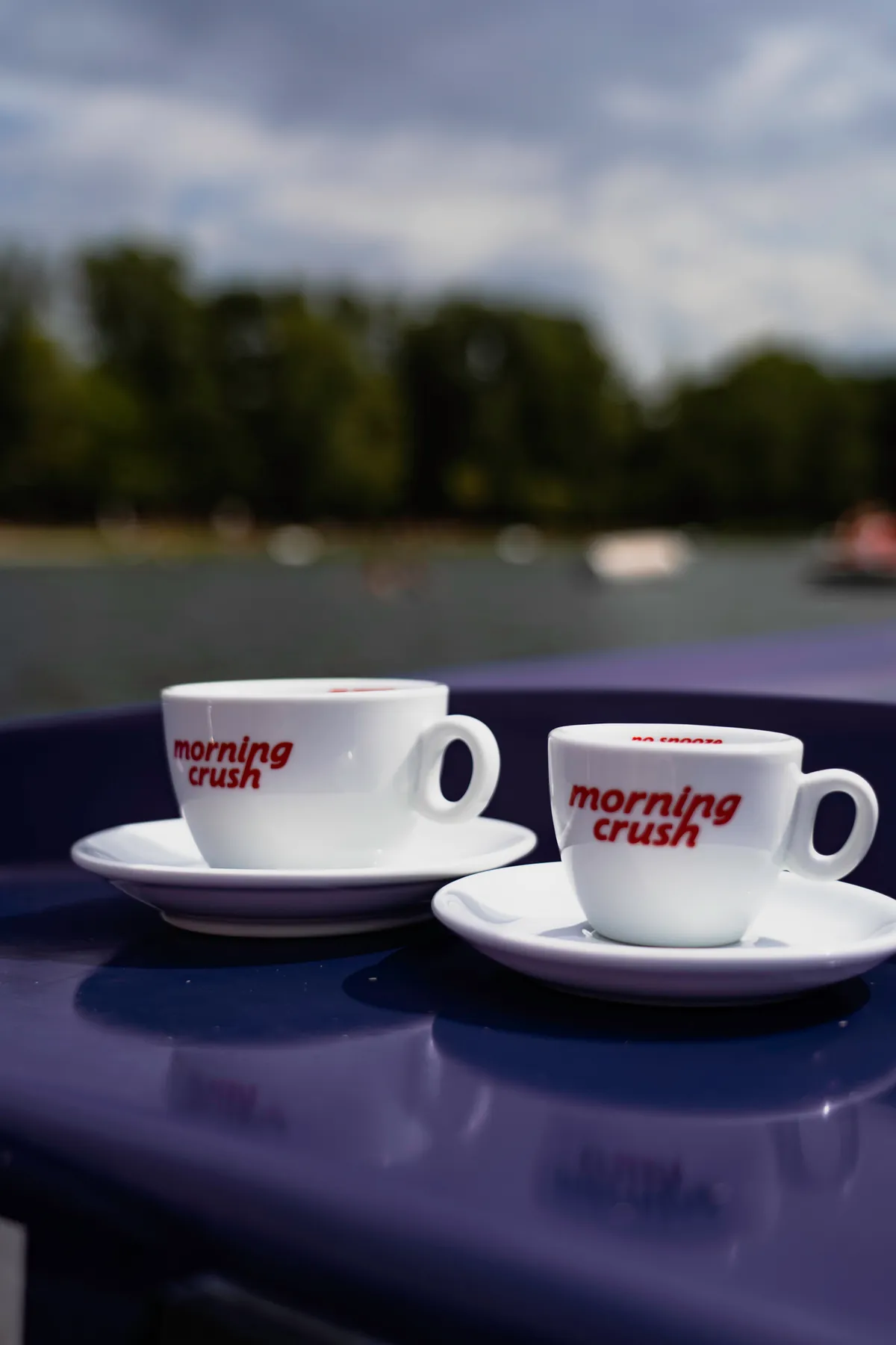 Two Morning Crush cups on the deck of a boat on the Alte Donau